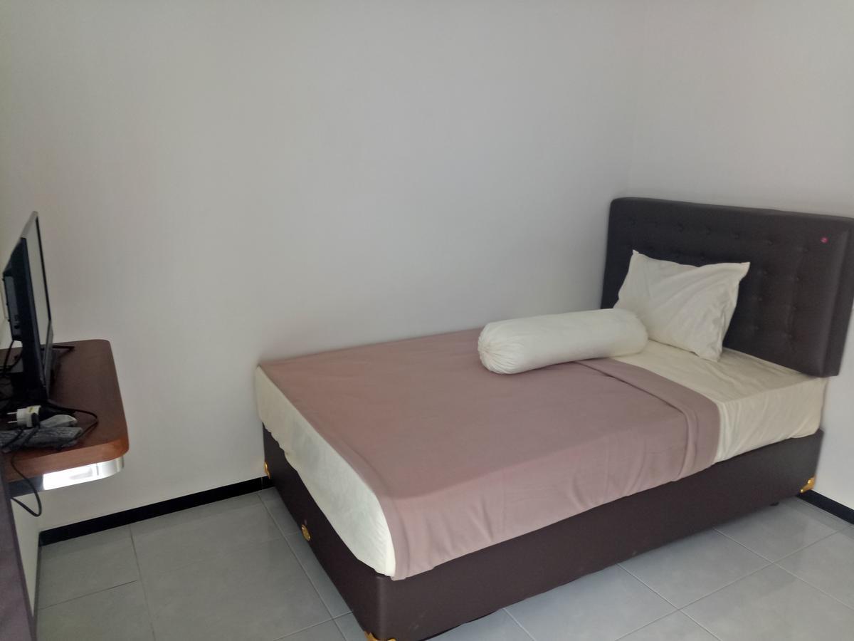 Sultan Guesthouse ตุลุงอากุง ภายนอก รูปภาพ