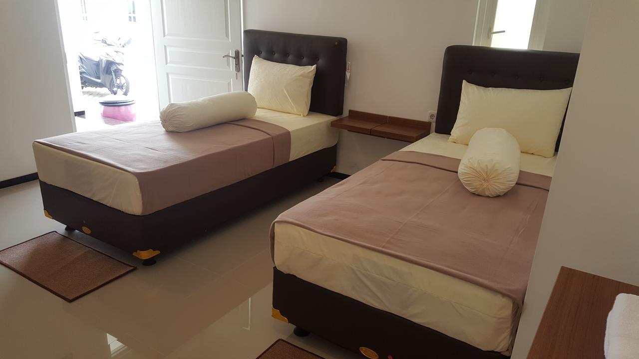 Sultan Guesthouse ตุลุงอากุง ภายนอก รูปภาพ